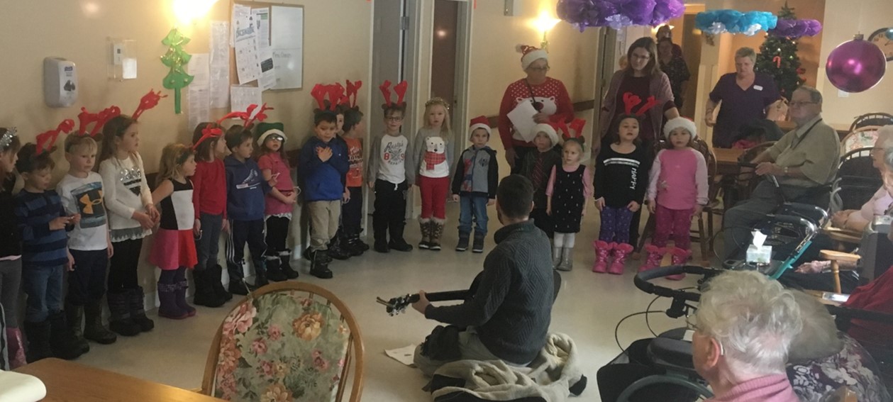 December 22, 2016 - Kindergarten students from St. Philip's school performing Christmas carols.